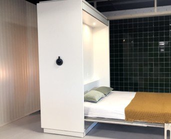 The flexible furniture wall: an innovative urban living project