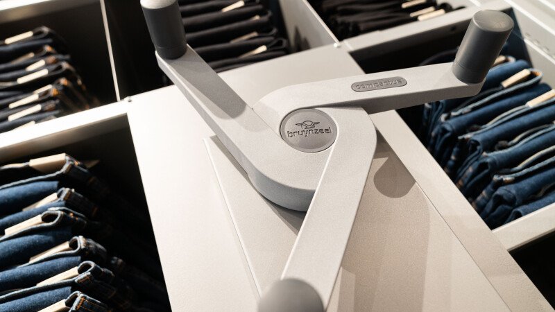 Use a hand crank to open the system